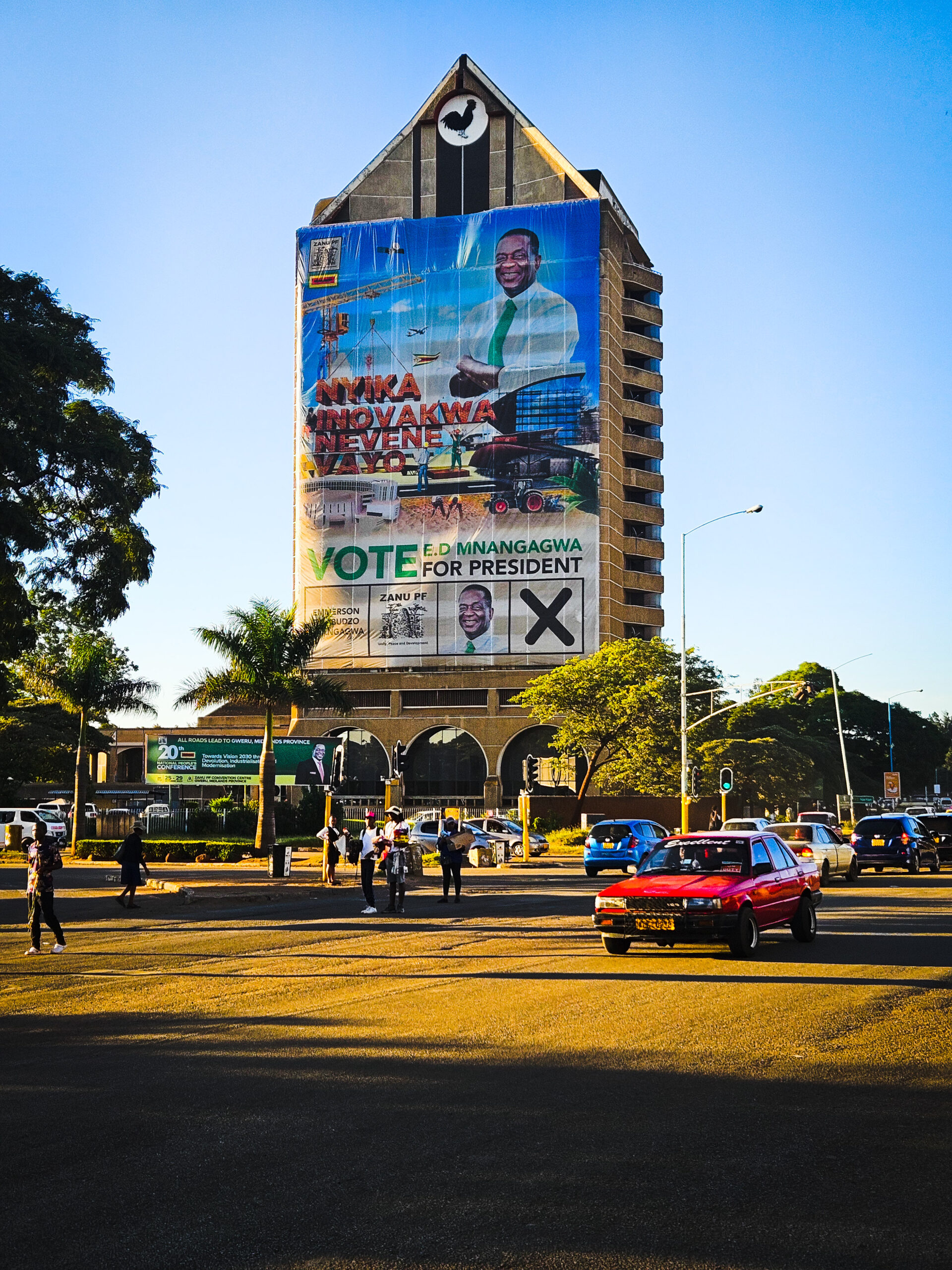 Emmerson Mnangagwa's billboard hangs on Zanu PF Headquaters building ahead of the harmonised elecetions